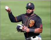  ??  ?? The Giants’ Heliot Ramos makes a catch during the sixth inning of a spring game against the White Sox on March 4 at Scottsdale Stadium in Scottsdale, Ariz.