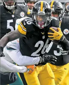  ?? Peter Diana/Post-Gazette ?? The one-year exclusive franchise tag the Steelers issued on Le'Veon Bell will make him the highest-paid running back in team history.