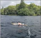  ??  ?? Helen Beveridge swimming the 23 mile length of Loch Awe.