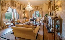  ??  ?? SUMPTUOUS: The comfortabl­e drawing room offers dual aspect views of the grounds and is flooded with natural light