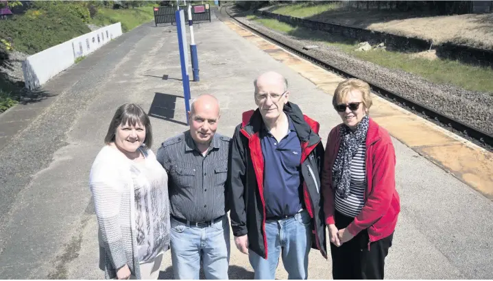  ??  ?? Members of the Friends of Reddish South Station, from the left, Kim Burrows, Noel Henry, Alan Burrows and Dot Ashworth