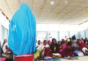  ??  ?? In Kaleri, near a railway station where Boko Haram started, children share child friendly space once a week