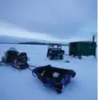  ??  ?? An ice hut and snowmobile ready for a morning of fishing.