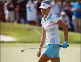  ?? FRANK GUNN — THE ASSOCIATED PRESS ?? Lexi Thompson holds a one-shot lead over four other golfers in LPGA Mejier Classic on Saturday.