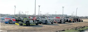  ??  ?? Cars in 358 modified, Merrittvil­le Speedway's premier racing class await their turn for warmup laps at a test and tune Saturday at the Thorold track.