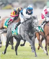  ?? Picture: MICHAEL DODGE/GETTY ?? Zilbiyr races past the field to win with Beau Mertens on board.