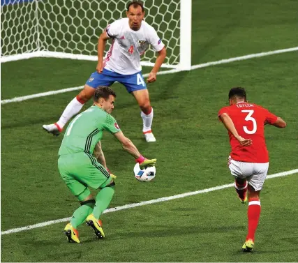  ?? Ian Walton/getty Images ?? Neil Taylor scores in Wales’s 3-0 win against Russia at Euro 2016.