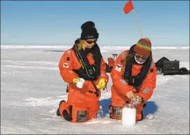  ?? Kajetan Deja Mine Tekman ?? SCIENTISTS COLLECT snow samples in the Arctic, where microplast­ics have been found. Experts suspect the high levels of the particles arrived by water or air.