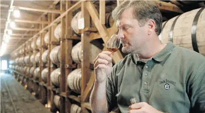  ?? MARK HUMPHREY/THE ASSOCIATED PRESS /FILE ?? Distillers must age spirits in unused white oak barrels if they want to label their product Tennessee whiskey.