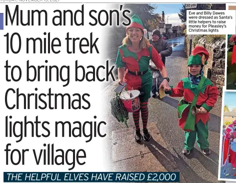  ?? ?? Eve and Billy Dawes were dressed as Santa’s little helpers to raise money for Pleasley’s Christmas lights