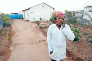  ??  ?? Sophia Meyer outside the home she shared with her husband Walter in Upington.