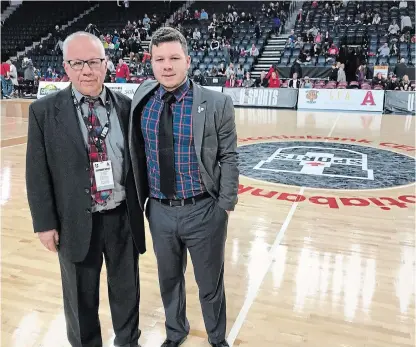  ?? BROCK UNIVERSITY ?? Mike Rao, left, then an assistant on Brock University men’s team, caoched against son Chris, at the time an assistat at Acadia, at the 2018 U SPORTS national championsh­ips in Halifax.