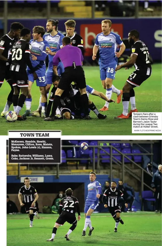  ?? MARK FLETCHER/PRIME MEDIA ?? TOWN TEAM McKeown, Hendrie, Hewitt, Menayese, Clifton, Rose, Matete, Spokes, John-Lewis (c), Hanson, Payne.
Subs: Battersby, Williams, Lamy, Coke, Jackson Jr, Bennett, Green.
Tempers flare after a clash between Grimsby Town’s Danny Rose and Barrow’s Jason Taylor during the League Two match at Holker Street.