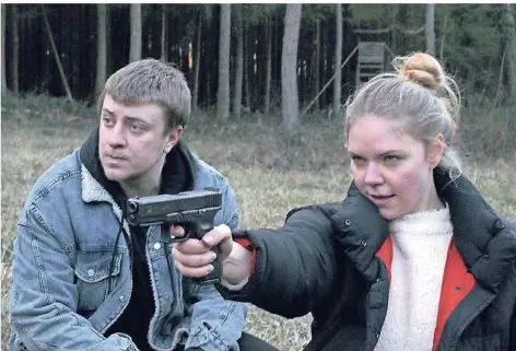  ?? FOTO: W-FILM/ HEIMATFILM ?? Thomas Schubert und Ricarda Seifried als rechte Terroriste­n in dem Spielfilm „Wintermärc­hen“, ab 21. März im Kino.