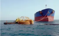  ?? — Bloomberg ?? An oil tanker offloads into a single buoy mooring at the start of the Sumed pipeline in the Gulf of Suez.