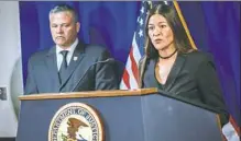  ?? Andrew Rush/Post-Gazette ?? Acting U.S. Attorney Soo C. Song announces an indictment of three Chinese nationals in an internatio­nal computer hacking case Monday. The hackers allegedly targeted corporate victims in the U.S., including Siemens AG offices in Pittsburgh.