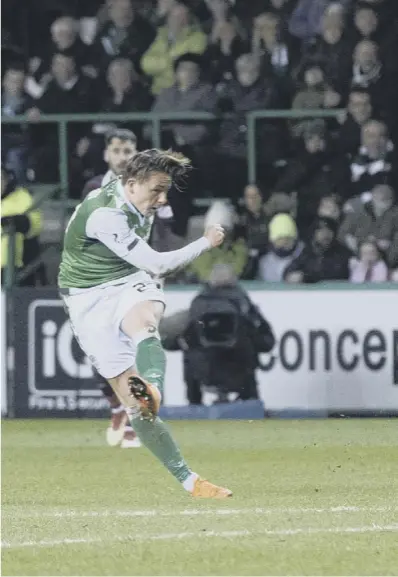  ??  ?? Hibernian midfielder Scott Allan rifles home a sweetly-hit drive for his side’s opening goal against Hearts to pave the way for the Easter Road side’s victory in last night’s Edinburgh derby.