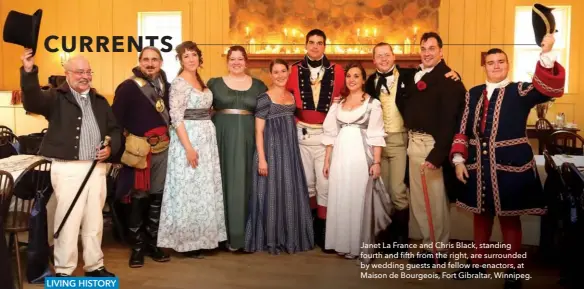  ??  ?? Janet La France and Chris Black, standing fourth and fifth from the right, are surrounded by wedding guests and fellow re-enactors, at Maison de Bourgeois, Fort Gibraltar, Winnipeg.