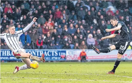  ?? Picture: SNS. ?? St Mirren’s Liam Smith scores his side’s second goal against Dunfermlin­e.