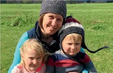  ??  ?? Forty-year-old Tamara Malone - holding two of her five children, Maddison, 5, and Finn, 3 - is not eligible for the life-extending breast cancer drug being funded by Pharmac from January 1.