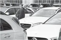  ?? SEAN GALLUP GETTY IMAGES ?? The gains made in car registrati­ons in Europe in March erased an early-year decline to leave sales up 0.9 percent for the quarter. Pictured: a Mercedes-Benz dealership in Berlin.