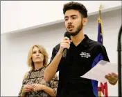  ?? PHOTOS BY ERIC PATTEN/YUMA UNION HIGH SCHOOL DISTRICT ?? SAN LUIS SENIOR SISTO FELIX ADDRESSES students at the fall Yuma Youth Town Hall on Friday at Arizona Western College. Behind Felix is co-organizer Shelley Mellon.