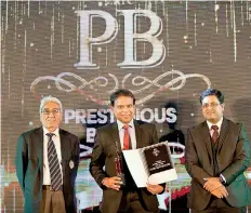  ??  ?? From left: India Thai Business Associatio­n President Satish Segal, Maliban Biscuits Sales and Marketing CEO Ravi Jayawarden­a and Brand Advertisin­g Research Consulting CEO Saimik Sen