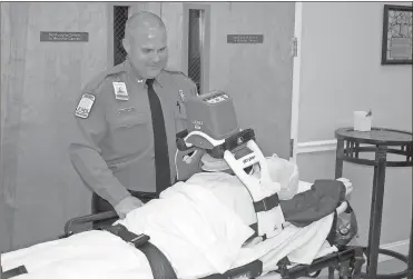  ?? / Doug Walker ?? Metro Atlanta EMS paramedic Tony Zajac displays the Lucas CPR Compressio­n device that does CPR compressio­ns on patients for up to two hours. The device is on all of the Metro Atlanta ambulances that will be servicing Bartow County beginning Oct. 1.