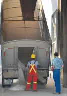  ?? NEW FILE PHOTO ?? A grain truck is unloaded in this 2012 file photo of work at the Bow Island location of Viterra. The location has yet another owner, it was announced Monday. Richardson Internatio­nal has acquired nine locations of CHS Dynagra, including the Bow Island...