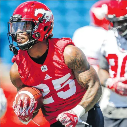  ?? AL CHAREST ?? Running back Don Jackson of the Calgary Stampeders goes through his paces during practice leading up to Saturday’s season opener against the Hamilton Tiger-Cats at McMahon Stadium.