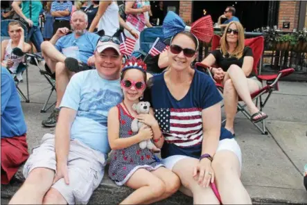  ?? PHOTOS BY LAUREN HALLIGAN — LHALLIGAN@DIGITALFIR­STMEDIA.COM ?? Cassandra, Cris and Maddie Palmer of Wilton at the 10th annual Saratoga’s All-American Celebratio­n on Tuesday in downtown Saratoga Springs.