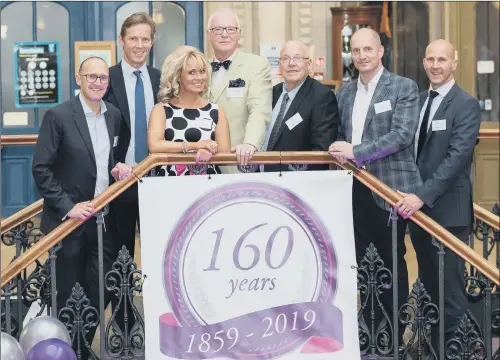  ??  ?? DEAL: Adair Paxton’s directors Guy Roberts, William Marshall, Nicola Thompson, Bruce Collinson, Steven Theaker, Simon Dalingwate­r, Mark Roth, at a birthday celebratio­n earlier this year.