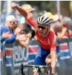  ??  ?? Jason Christie celebrates his win in the 171km road race at the national championsh­ips in Napier.