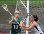  ?? PETE BANNAN — DIGITAL FIRST MEDIA ?? Bishop Shanahan’s Monica Manley (10) carries the ball out of the defensive zone against Radnor in the first half of Radnor’s 12-6 District 1 Class 2A title win at Henderson Thursday.