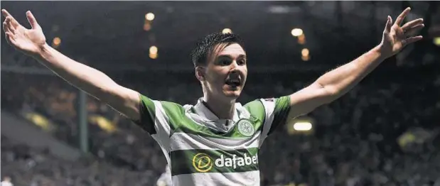  ??  ?? TWO: Celtic’s Kieran Tierney celebrates after his cross was turned into his own goal by Manchester City’s Raheem Sterling