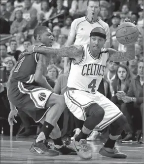  ?? AP FILE NFL ?? Boston Celtics’ Isaiah Thomas drives to the basket during a second-round playoff game against the Washington Wizards in May.