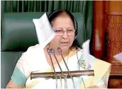  ??  ?? Papers being thrown at Speaker Sumitra Mahajan’s Chair in the Lok Sabha in New Delhi on Monday. — PTI