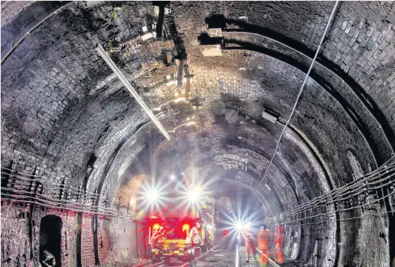  ??  ?? > Electrific­ation work under way inside the Severn Tunnel last year