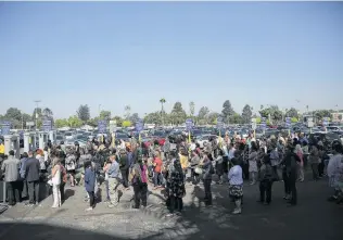  ??  ?? The faithful wait in lines to get into one of Osteen’s Night of Hope events in Inglewood, Calif.