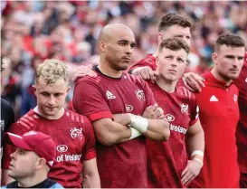  ?? ?? Paying the penalty: Munster players dejected at final whistle