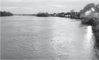  ??  ?? A late-day view of the Thames, seen from Hammersmit­h, a district of west London. Visitors to London looking to save money might consider lodging away from central London.