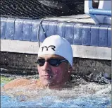  ?? Julio Aguilar / Getty Images ?? Ryan Lochte looks to the time display after winning heat 2 of the 200 individual medley at the U.S. Open Championsh­ips on Friday afternoon in Sarasota, Florida.