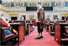  ??  ?? Ben Franklin, portrayed by Stephen Smith, speaks in the Senate chamber during Colonial Day at the state Capitol on Friday.