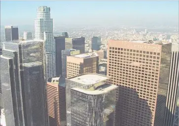  ?? Rick Meyer Los Angeles Times ?? THE LIBRARY TOWER — later the First Interstate World Center, now the US Bank Tower — was among a crop of high-rises on Bunker Hill that radically altered Los Angeles’ skyline in the 1980s.