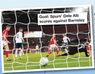  ??  ?? Goal: Spurs’ Dele Alli scores against Barnsley