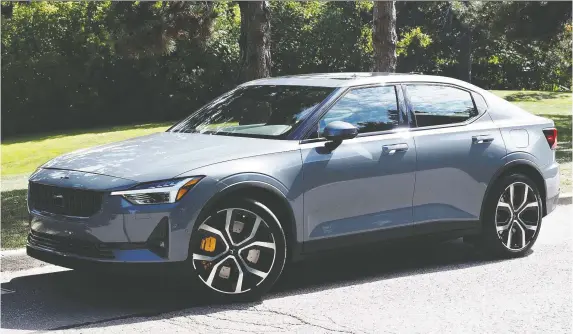  ?? PHOTOS: CHRIS BALCERaK/DRIVING ?? The 2021 Polestar 2's twin electric motors together provide a total of 408 horsepower and 487 pound-feet of torque.