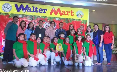  ??  ?? The University of the Assumption Grade School's Munting Tinig emerged as champion in the 2016 Waltermart Pamaskong Himig Bulilit held recently in the City of San Fernando, Pampanga. Munting Tinig bested 5 other competing choirs from different member...