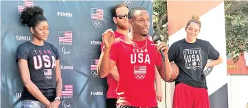  ??  ?? Team USA Rugby wing Carlin Isles with fellow US Olympians as he speaks at an event making the two-year countdown to the Summer Games in Tokyo, in Los Angeles, California, US. — Reuters photo