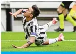  ?? — AFP ?? TURIN: Juventus’ Argentine forward Paulo Dybala falls after colliding with Sampdoria’s Gambian defender Omar Colley during the Italian Serie A football match.