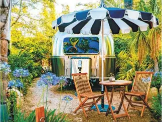  ?? @adventureb­uddies42 / Caravan Outpost ?? AIRSTREAMS and wine tastings are found at Ojai’s Caravan Outpost, above.